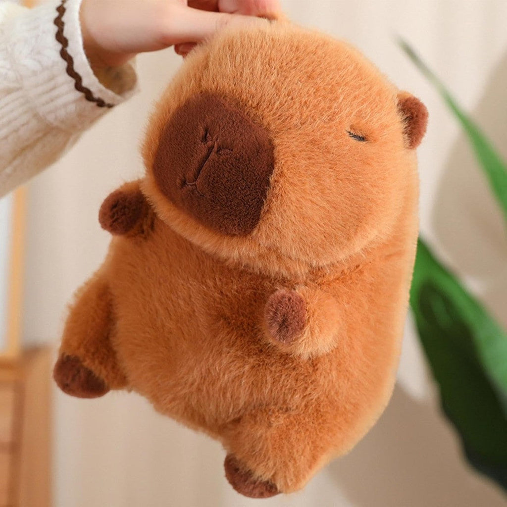 Capybara mit Gemüse-Mütze und Tasche