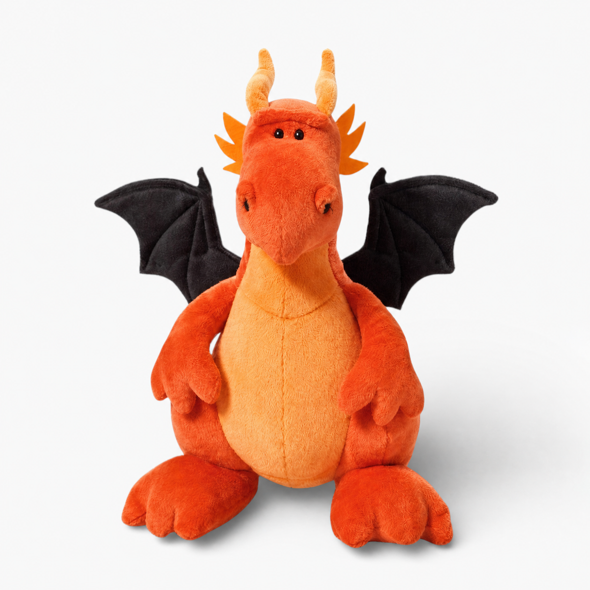 Oranger Drache mit schwarzen Flügeln