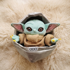 Grogu im Schwebe-Kinderwagen Kuscheltier 23 cm
