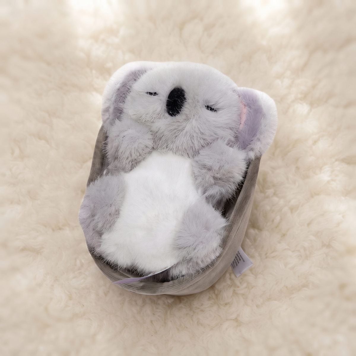 Schlafender Koala im Körbchen 18 cm
